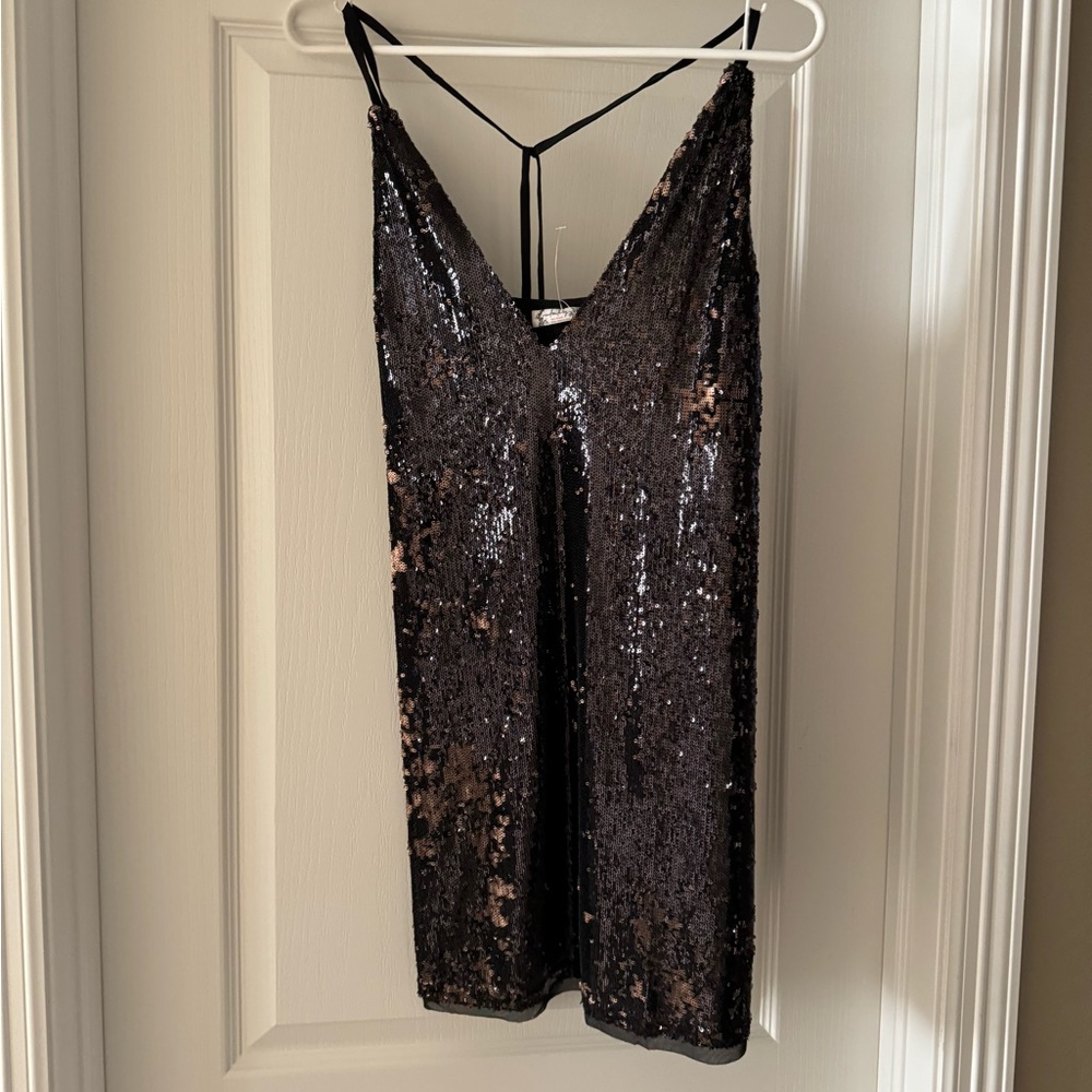 NWT Free People Black Rose Combo, size M.